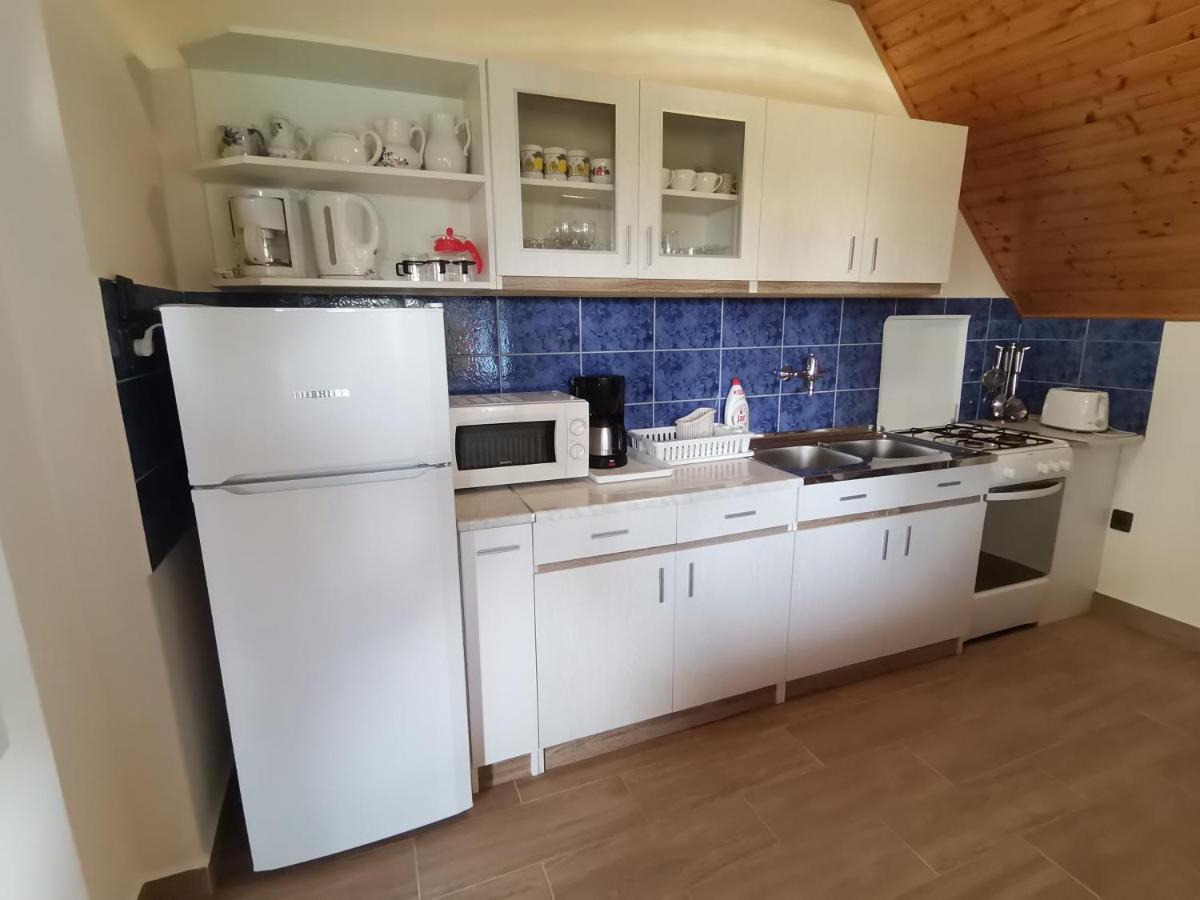 Szoloskert Apartman แชร์สเซกโตไม ภายนอก รูปภาพ